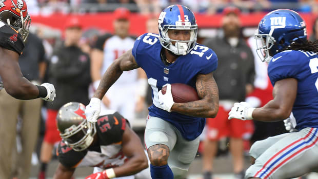 Oct 1, 2017; Tampa, FL, USA; New York Giants wide receiver Odell Beckham Jr. (13) runs with the ball in the first half against the Tampa Bay Buccaneers at Raymond James Stadium.